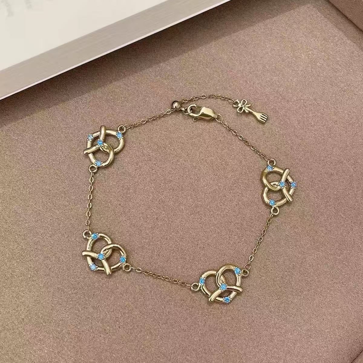 Coffee Gold-Tone Pretzel Knot & Blue Stone Jewelry Set