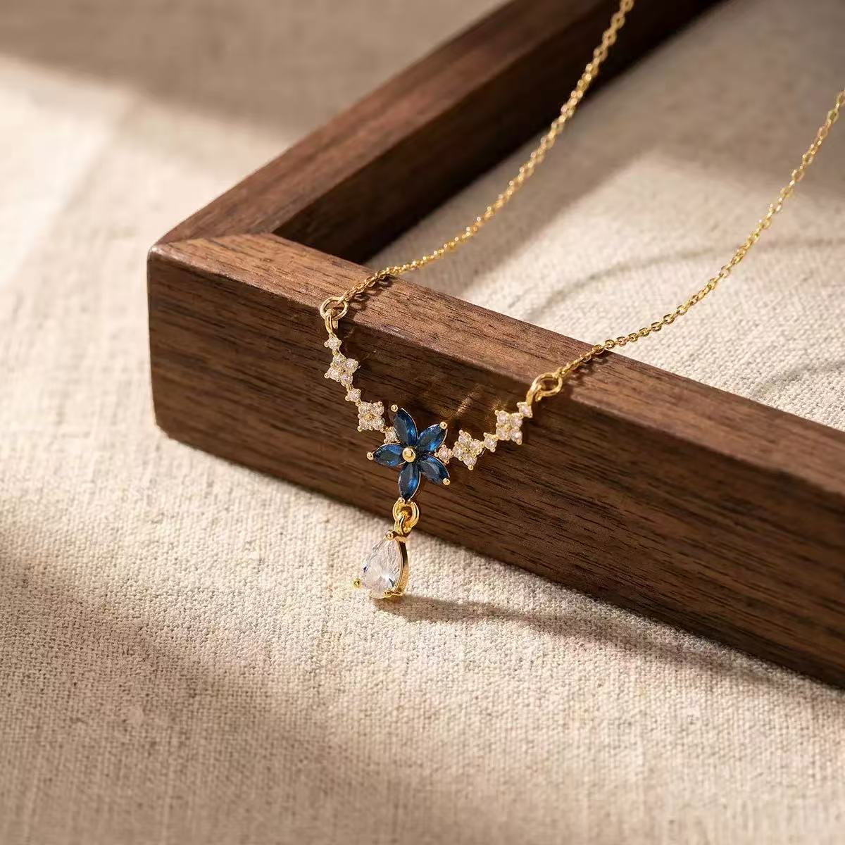 Elegant Blue Diamond Floral Necklace