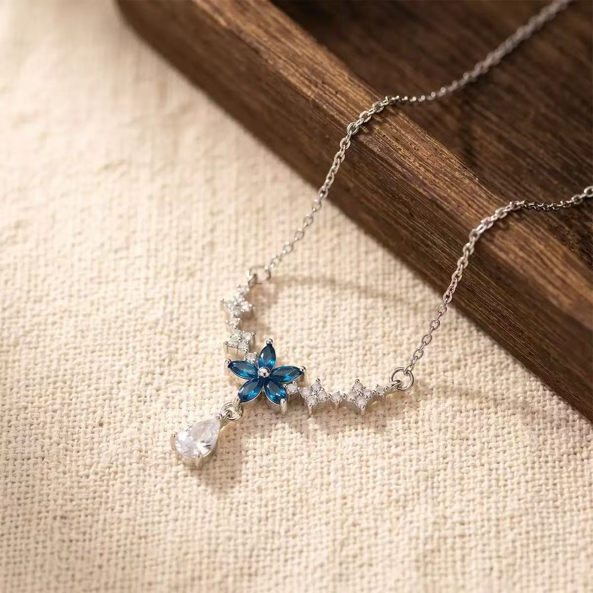 Elegant Blue Diamond Floral Necklace